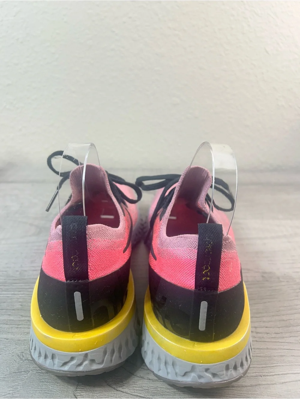 Nike women’s Epic React Flyknit 10.5Pink Black Running Sneakers with Yellow Heel